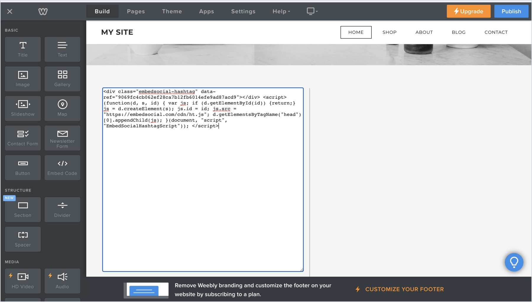 Pasting the widget code on the Weebly editor